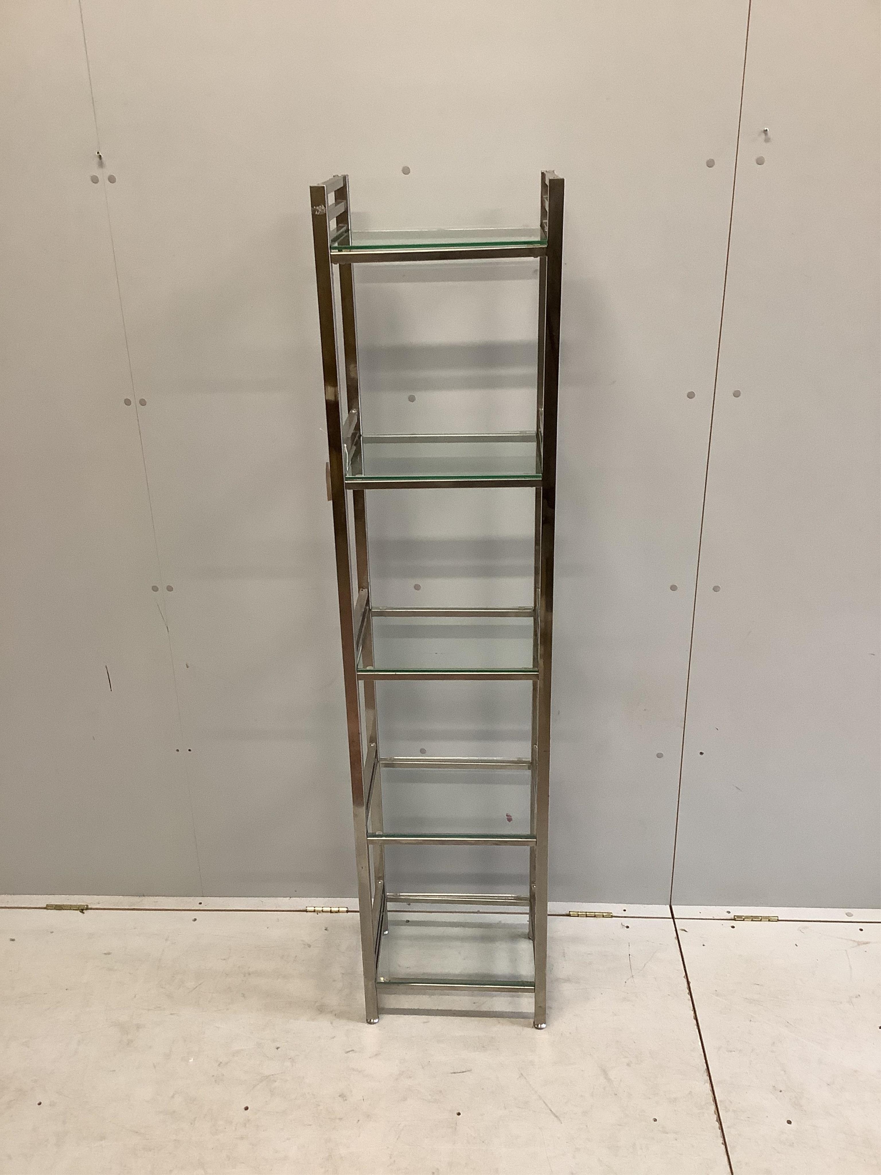 A chrome and glass five tier display unit, width 40cm, depth 30cm, height 176cm. Condition - fair